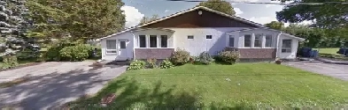 Duplex à la campagne – Potentiel à Exploiter avec Grand Terrain Image# 1