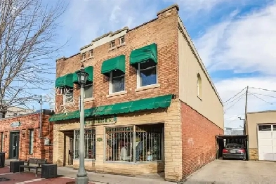 MULTI-USE COMMERCIAL STOREFRONT WITH FULL RESIDENCE ABOVE! Image# 1