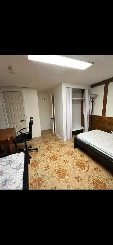 A private room is available for rent in a walkout basement. Image# 3