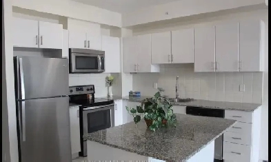 Lease: 1 Den 2 Baths, Heat, Water, Locker, Parking Included Image# 4