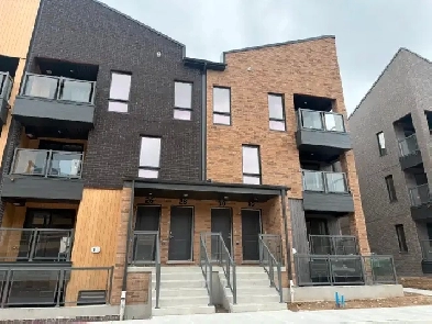 Brand New Stacked Townhouse — Corner Unit, 2 Bed, 2.5 Bath Image# 1