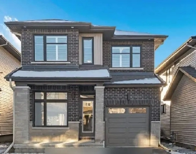 Semi-furnished dream home in the heart of Findlay Creek Image# 1