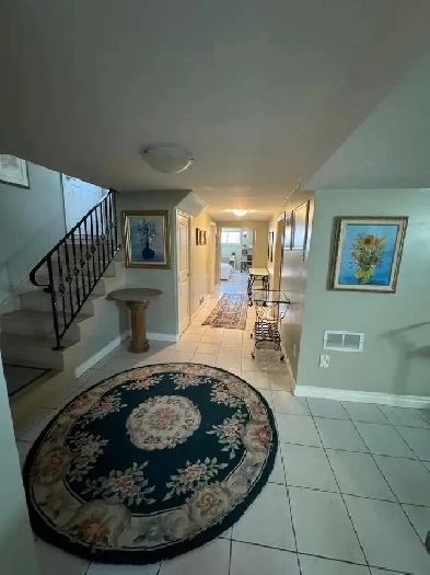 Huge, bright, furnisher, very high ceilings basement apartment Image# 2