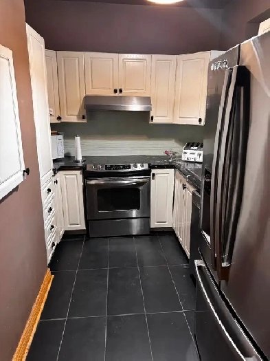 Condo moderne et équipé - centre-ville Image# 1