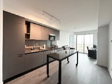 MODERN 2 DEN CONDO WITH STUNNING CITY AND CONSERVATION VIEWS Image# 5