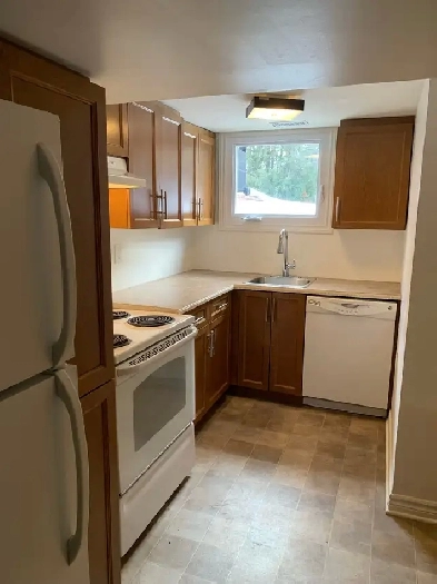 1-bedroom   den lower level unit in Cardinal Heights Image# 1