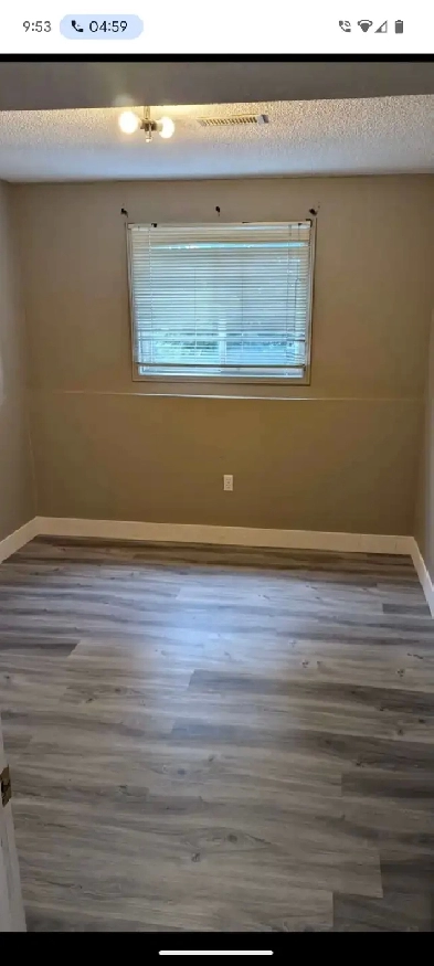 A beautiful room for rent in a walkout basement. Image# 7