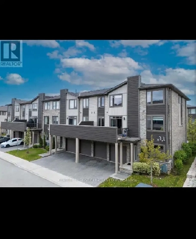 RARE CORNER UNIT | Modern Townhome in Summerside | Double Garage Image# 1