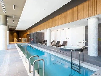 Wow! Condo 2 1 cac et 2 sdb et terrasse! Garage! Image# 1