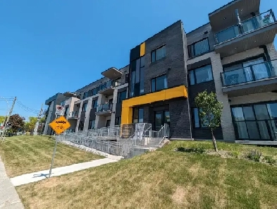 Condo à louer 1er juillet-août Laval Fabreville immeuble récent Image# 3