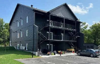 Logement 3-1/2 immeuble neuf PROMO- Val-Joli Image# 1