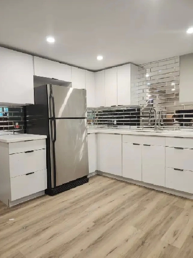 Tastefully Renovated Basement Apartment ~ Utilities INCLUDED Image# 1