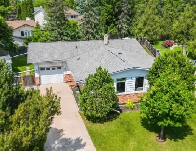 1353SF Bungalow in Niakwa, 4 bed, 2 baths, huge yard! Image# 4