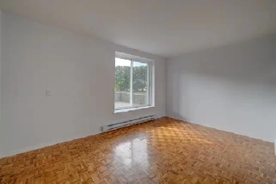 Beau grand 4.5 au 1er étage avec air climatisé & stationnement! Image# 8