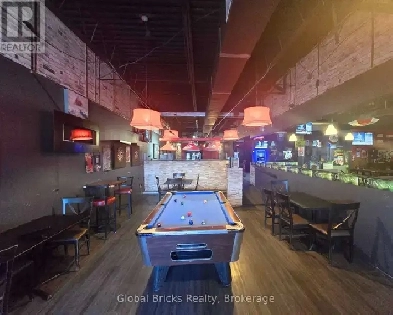 FOR SALE: Thriving Community Bar/Pub Image# 1