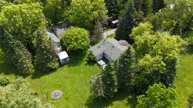 Bungalow with  3 car garage and barn in Orono! Image# 1