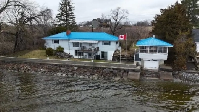 Waterfront Bungalow with Boat House Image# 1