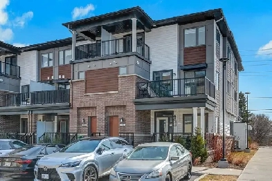 Upgraded 3 bedroom, 2 bath end-unit stacked townhome Image# 5