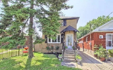 Spacious 4-Bedroom Home with In-Law Suite in Prime Toronto Area Image# 1