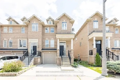 EXECUTIVE CORNER FREEHOLD TOWNHOUSE Image# 1