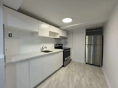 FULLY RENOVATED & FRESHLY PAINTEDSemi-Basement apartment! Image# 6