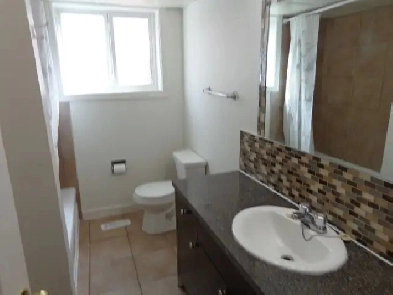 Two-bedroom, legal walkout suite includes utilities Image# 2