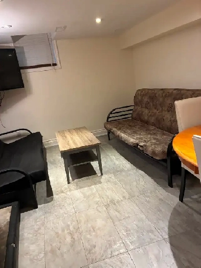 1 bedroom and den basement apartment in key location in Toronto Image# 5