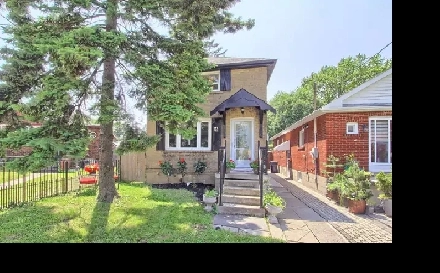 Spacious 4-Bedroom Home with In-Law Suite in Prime Toronto Area Image# 1