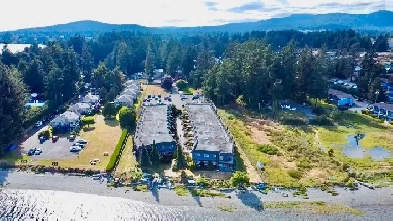 Oceanfront living in 1 bed, 1 bath ground level Sooke, BC condo. Image# 1