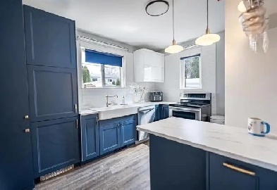 2-Bedroom Main Floor Unit | Private Backyard | St. James Image# 1