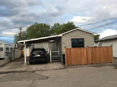 Renovated mobil home with a large addition located in a Calgary Image# 4