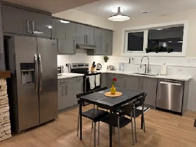 Stampede short term rental two bedroom suite fully furnished Image# 3
