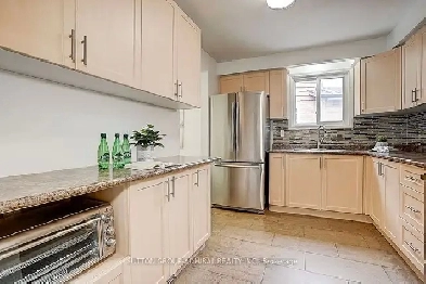 This beautifully maintained home offers bright and open living s Image# 3