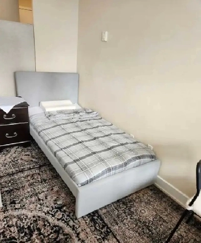 One bed in a living room Image# 4