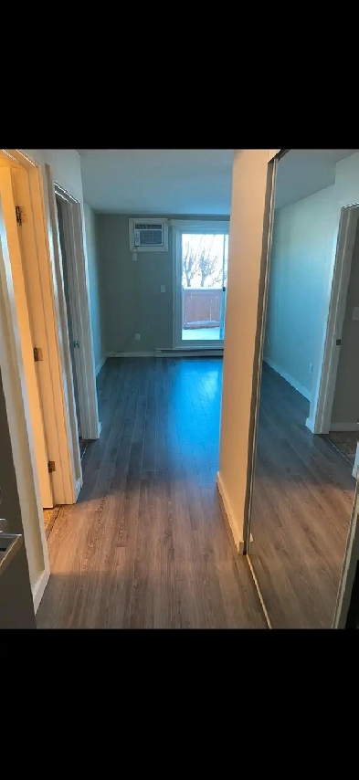 1BR Ground Floor Condo – Yard, Parking, Laundry – Pet Friendly Image# 1