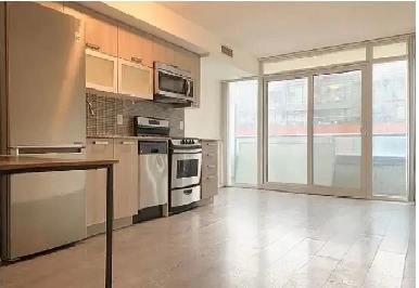 High ceiling large two bedroom and one full washroom condo Image# 5