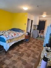 Bachelor apartment for rent with parking Image# 3