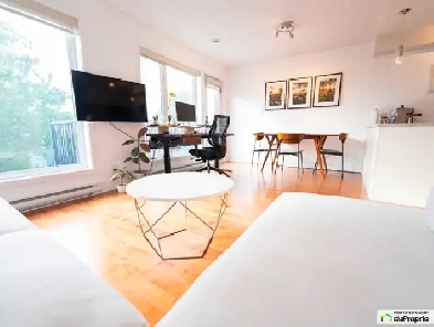 Sunsets & Style: 2-Level Saint-Henri Condo Image# 9