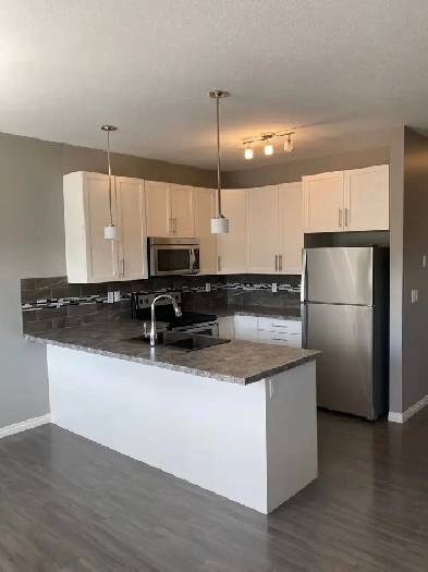 Beautiful 3 bed/2 bath townhouse for rent in Penhold! Image# 1