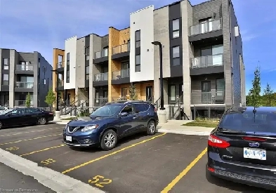 Modern 3-Bedroom Walk-Out Bungalow-Style Stacked Townhome! Image# 8