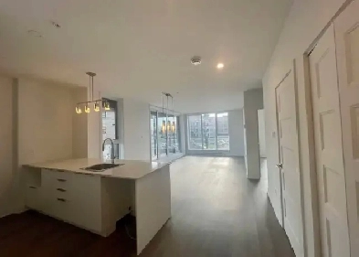 Condo NEUF 5 1/2 1400 pi2 - Internet inclus   parking intérieur Image# 5