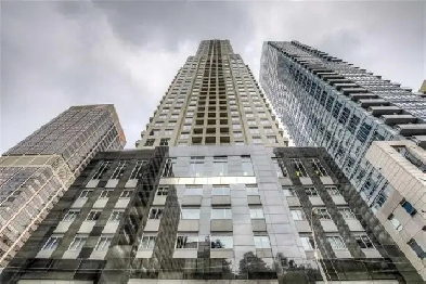 UPTOWN: LARGE 1 BEDROOM   DEN CONDO W/LOCKER AT BLOOR & YONGE Image# 1