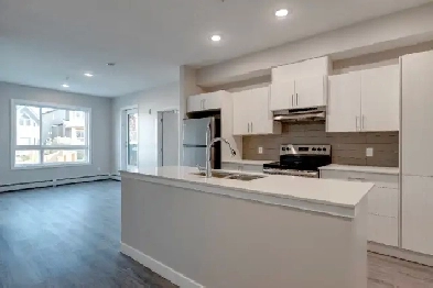 OFFERING NOW TOP FLOOR UNITS    1403 26A ST SW. Image# 12