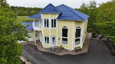 Unique custom designed home with turret entrance Image# 1