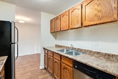 Apartments for Rent In Southwest Calgary - Woodlands Manor - Apa Image# 1
