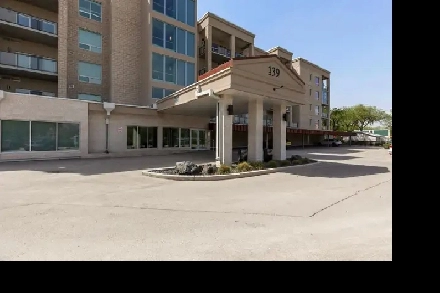 FOR SALE! Impeccable 2 Bed, 1 Bath, 2 indoor parking! Image# 1