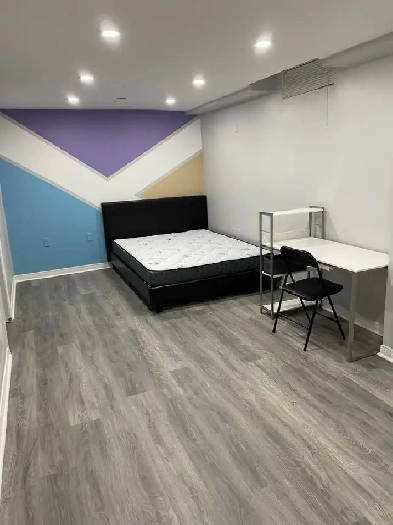 a big room with private kitchen & bathroom in the basement Image# 1