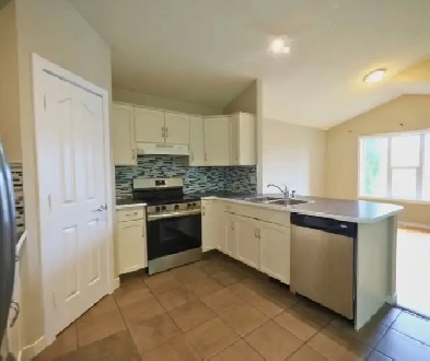 Okotoks House RENTAL:  3 Bed/ 2 Bath /DB Garage   Utility Inc. Image# 1