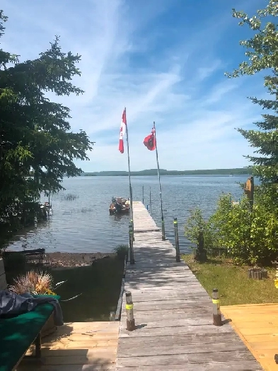 Cozy camp on the lake at Whitefish Resort W/Boat Image# 1