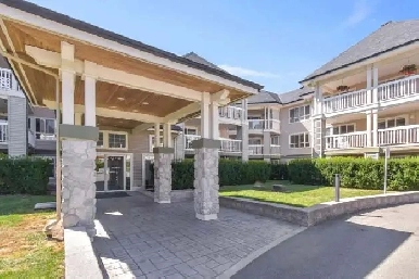 Tastefully Updated Corner Unit! Image# 1